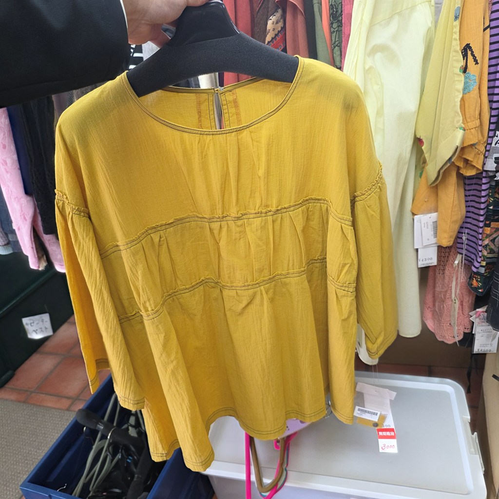 デザイン性のある黄色の婦人服在庫